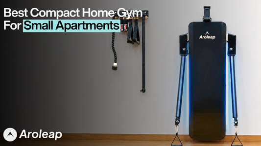 Banner for Aroleap titled 'Best Compact Home Gym For Small Apartments' featuring the Aroleap X smart fitness unit mounted on a wall with its arms extended alongside organized wall-mounted gym accessories."